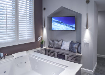 Alternate View of Bathtub w/ TV and Seating Area