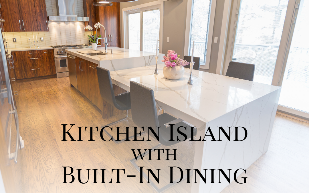 A kitchen island that has a dining table built into it, with text on top of it that says "Kitchen Island with Built-In Dining"