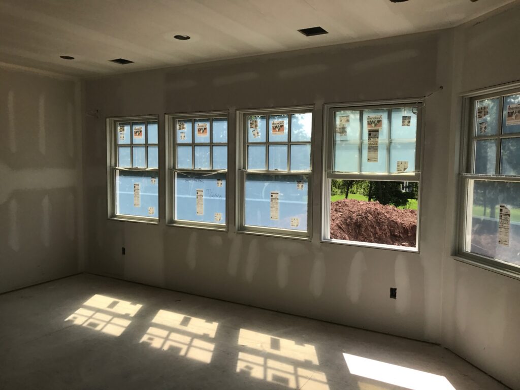 mid-construction windows, otherwise empty room
